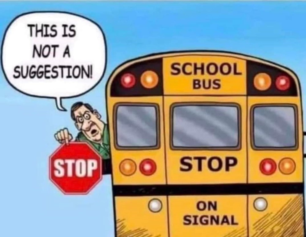 School Bus with stop sign out and a sign that say This is not a suggestion! 