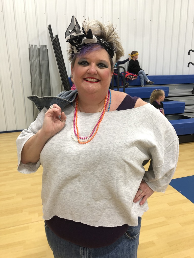 Ms. Straw dressed in 80s style