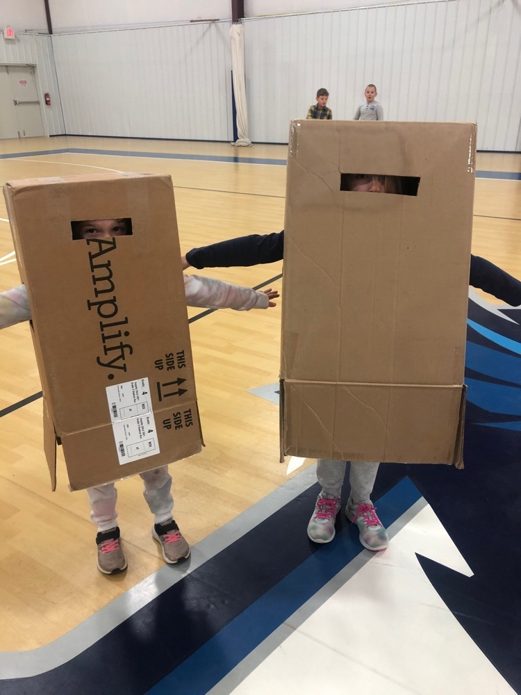 kids playing g with boxes