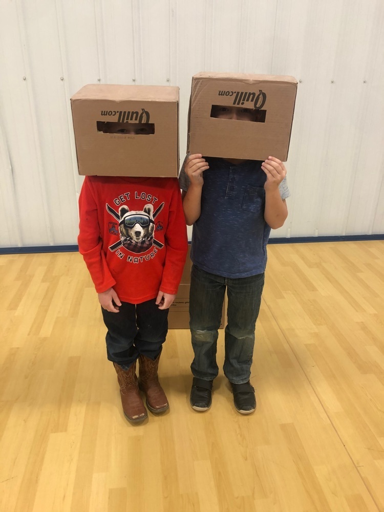 kids playing twih boxes 